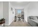 Bright home office space with a modern desk, ample shelving, and neutral walls, ideal for remote work at 85 Sun Mdw Cir, Benson, NC 27504
