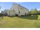 Large backyard featuring a deck, grassy area and mature trees at 8812 Green Arbor Ct, Wake Forest, NC 27587