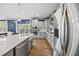 Bright kitchen featuring a stainless steel fridge and ample countertop space at 8812 Green Arbor Ct, Wake Forest, NC 27587