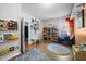 Bright playroom features a built-in bookshelf, window seat, and colorful decor, creating a fun and inviting space at 8812 Green Arbor Ct, Wake Forest, NC 27587