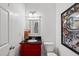 Stylish half bath with updated vanity, modern fixtures, and unique decor at 9100 Dansforeshire Way, Wake Forest, NC 27587