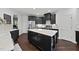 Modern kitchen with stainless steel appliances and plenty of counter space at 9100 Dansforeshire Way, Wake Forest, NC 27587