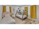 Bright bedroom featuring a bunk bed, a single bed and charming, beachy decor at 1008 Holloway St, Durham, NC 27701