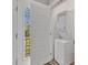 Convenient laundry room equipped with a stacked washer and dryer unit at 1008 Holloway St, Durham, NC 27701