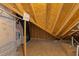 Unfinished attic space with exposed beams at 1011 Parker St, Raleigh, NC 27607