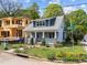Beautiful home with manicured lawn, inviting front porch, and classic architectural details at 1011 Parker St, Raleigh, NC 27607