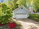 Garage with white door and brick pavers at 1011 Parker St, Raleigh, NC 27607