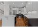 Beautiful kitchen with stainless steel appliances, white cabinets and a breakfast bar at 1011 Parker St, Raleigh, NC 27607