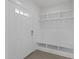 Bright mudroom features built-in shelving, hooks, bench, and storage, perfect for organization and convenience at 1011 Parker St, Raleigh, NC 27607