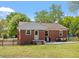 Spacious backyard with patio and mature trees at 1017 Southerlund Rd, Garner, NC 27529
