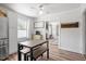 Eat-in kitchen features stainless steel appliances, adjacent dining table, and easy access to the living room at 1017 Southerlund Rd, Garner, NC 27529