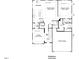 Detailed floor plan showcasing the first floor layout, including the kitchen, Gathering room, and two-bay garage at 1028 Channel Drop Lp, Zebulon, NC 27597