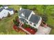 Aerial view showcasing the home's layout, landscaping, and spacious lot at 1053 Loop Rd, Clayton, NC 27527