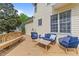 Inviting back deck with stylish seating and serene views of the surrounding landscape at 1053 Loop Rd, Clayton, NC 27527