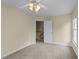 Comfortable bedroom with plush carpet and a view of the stairs at 1053 Loop Rd, Clayton, NC 27527