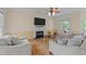Cozy living room featuring a fireplace and comfortable seating arrangement at 1053 Loop Rd, Clayton, NC 27527