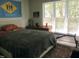 Cozy bedroom with ample natural light and space for rest and relaxation at 1062 Washington St # 201, Raleigh, NC 27605
