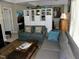 Comfortable living room featuring two sofas, decorative rug, shelving and artwork on the walls at 1062 Washington St # 201, Raleigh, NC 27605