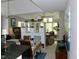 Bright and airy living room and dining room featuring built-in shelving and multiple windows at 1062 Washington St # 201, Raleigh, NC 27605