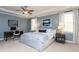 Serene main bedroom featuring plush carpeting, soft blue walls, and a well-lit desk area at 10709 Thornbury Crest Ct, Raleigh, NC 27614