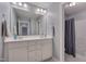 Well-lit bathroom with double sink vanity and separate shower/tub area at 109 Jones Creek Pl, Chapel Hill, NC 27516