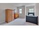 Cozy bedroom featuring a small wardrobe, a single bed and natural light at 109 Jones Creek Pl, Chapel Hill, NC 27516