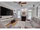 Comfortable living room with hardwood floors, fireplace, and neutral decor at 109 Jones Creek Pl, Chapel Hill, NC 27516