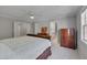 Light-filled main bedroom with ensuite bathroom access and neutral paint at 109 Jones Creek Pl, Chapel Hill, NC 27516