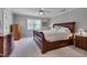 Spacious main bedroom with a ceiling fan, neutral decor, and natural light at 109 Jones Creek Pl, Chapel Hill, NC 27516