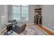 Cozy sitting area with corner bar and hardwood floors at 109 Jones Creek Pl, Chapel Hill, NC 27516