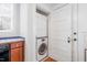 Convenient laundry area featuring stackable washer and dryer at 1105 W Lenoir St, Raleigh, NC 27603