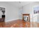 Bright living room with a fireplace and wood floors, and lots of natural light at 1105 W Lenoir St, Raleigh, NC 27603
