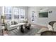 Bright living room with a comfortable couch and lots of natural light at 1105 W Lenoir St, Raleigh, NC 27603