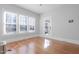 Bright living room with wood floors and lots of natural light at 1105 W Lenoir St, Raleigh, NC 27603