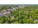 Neighborhood aerial view featuring homes among green trees near commercial areas at 118 Shannon Dr, Burlington, NC 27215