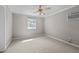 Bedroom featuring neutral walls, carpet flooring, and a window at 118 Shannon Dr, Burlington, NC 27215