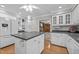 Beautiful kitchen featuring an island, sleek countertops, and lots of storage at 118 Shannon Dr, Burlington, NC 27215