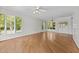 Bright and spacious living room with hardwood flooring and large windows at 118 Shannon Dr, Burlington, NC 27215