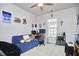 Cozy bedroom with desk, blue futon, and ample space for activities at 1201 Bellenden Dr, Durham, NC 27713
