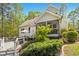Charming backyard features a screened-in porch, wooden deck and landscaped areas at 1503 Anterra Dr, Wake Forest, NC 27587