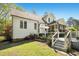 Charming backyard features a screened-in porch and a two-tiered wooden deck at 1503 Anterra Dr, Wake Forest, NC 27587