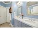 Bright bathroom with double vanity, marble countertops, and modern fixtures at 1503 Anterra Dr, Wake Forest, NC 27587