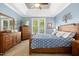 Tranquil main bedroom with tray ceiling, large window, and ample closet space at 1503 Anterra Dr, Wake Forest, NC 27587