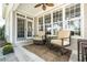 Comfortable porch with ceiling fan and chairs at 1545 Heritage Links Dr, Wake Forest, NC 27587