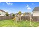 Backyard featuring wooden playground equipment at 1919 Sinclair Trce, Burlington, NC 27215