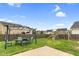 Spacious backyard with seating, playground and lush green grass at 1919 Sinclair Trce, Burlington, NC 27215