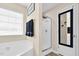 Bathroom featuring a separate tub, shower, and mirror at 1919 Sinclair Trce, Burlington, NC 27215