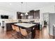 Kitchen featuring a center island with barstool seating and stainless steel appliances at 1919 Sinclair Trce, Burlington, NC 27215
