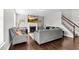 Bright living room with a fireplace, TV, comfortable seating, and hardwood floors at 1919 Sinclair Trce, Burlington, NC 27215