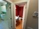 Half bath featuring a hardwood floor at 208 E Jules Verne Way, Cary, NC 27511